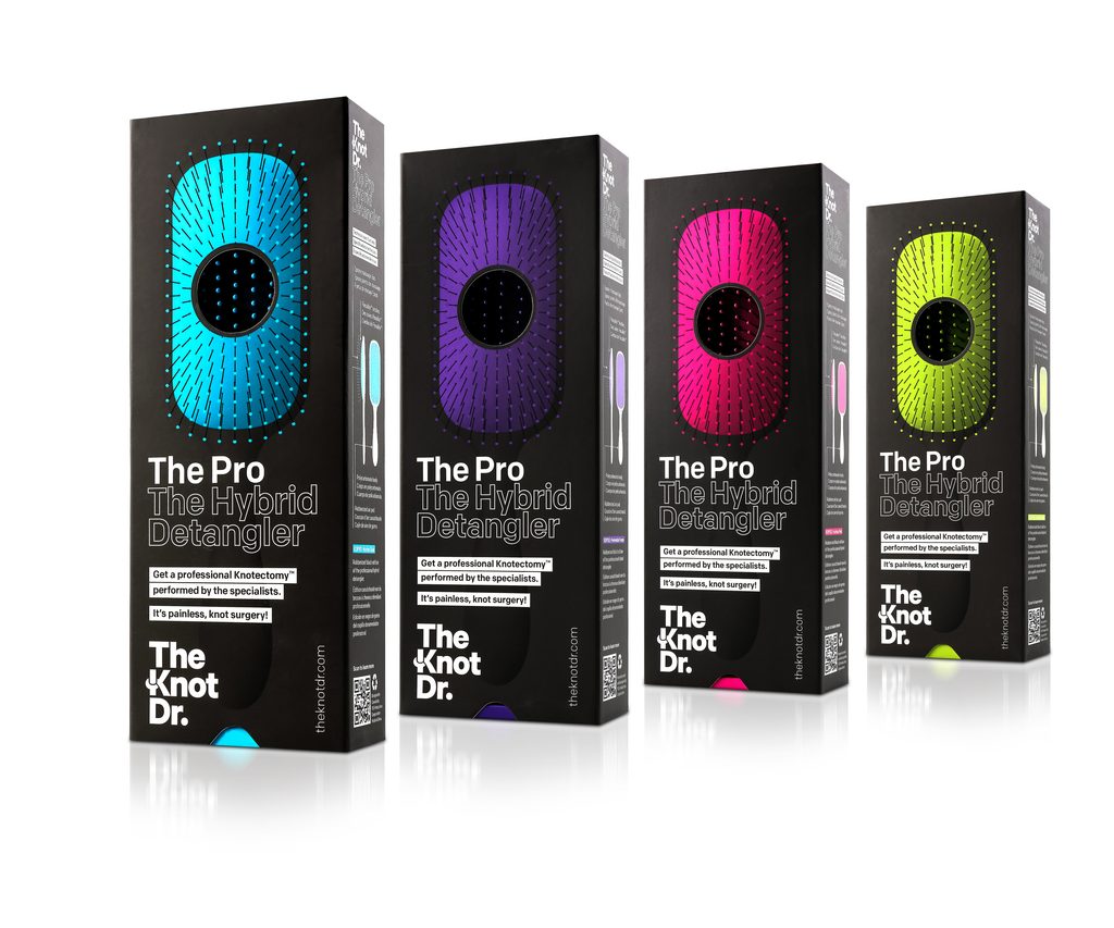 The Knot Dr. Pro Hybrid Detangler brushes with boxes in purple, green and blue
