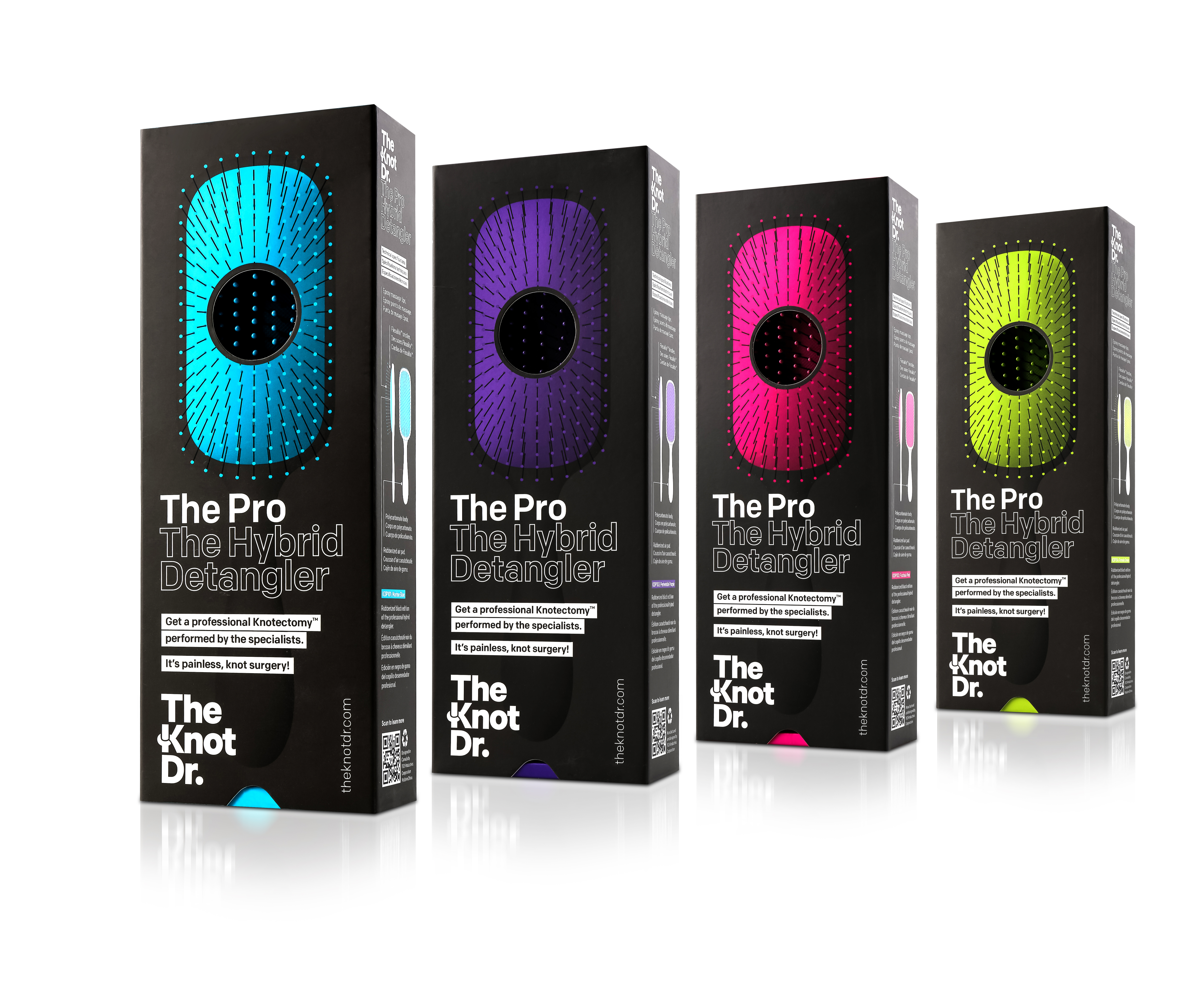 The Knot Dr. Pro Hybrid Detangler brushes with boxes in purple, green and blue