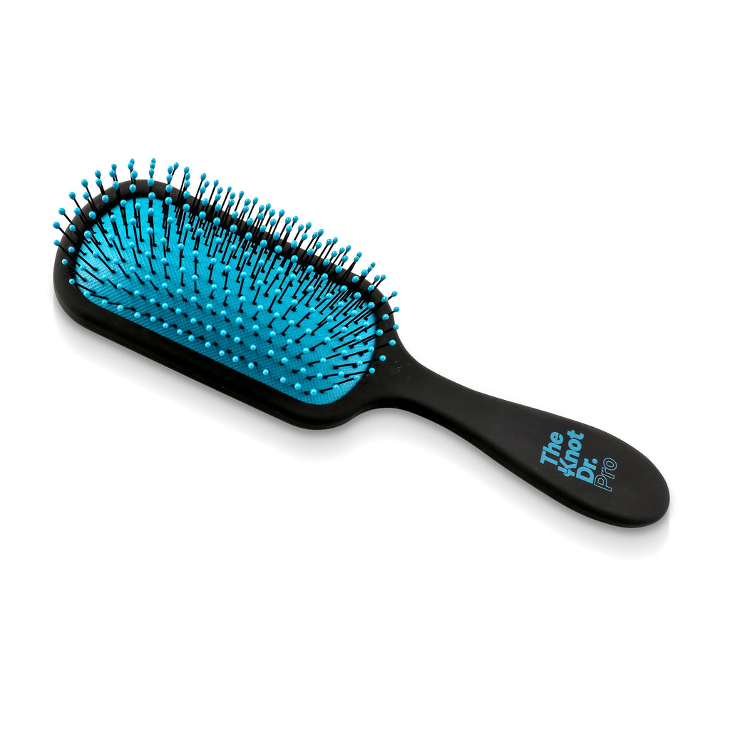 The Pro Hybrid Detangler brush in blue, flat view