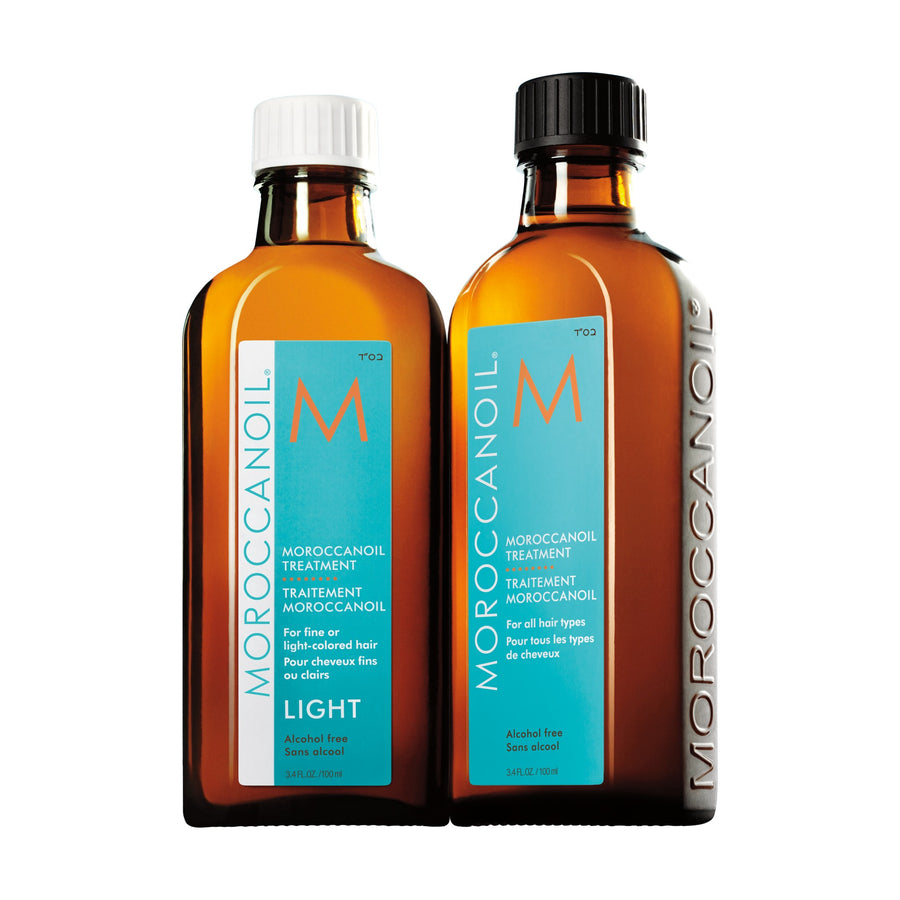 Moroccanoil Treatment Light and Original 100ml bottles side by side